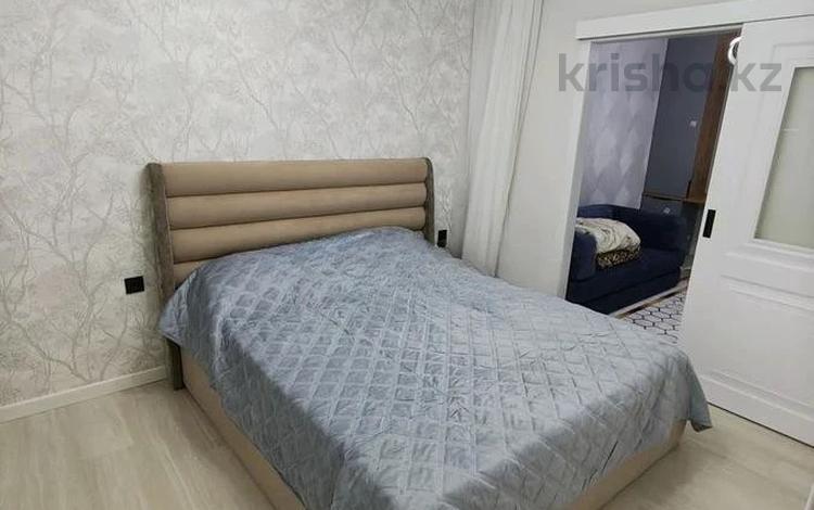 2-комнатная квартира · 57 м² · 4/9 этаж, мкр Аксай-1 за 31.5 млн ₸ в Алматы, Ауэзовский р-н — фото 8