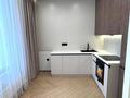 2-комнатная квартира · 40 м² · 12/16 этаж, Е-36, E-15 за 33.6 млн ₸ в Астане, Нура р-н — фото 16