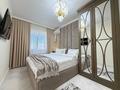 4-комнатная квартира · 100 м² · 10/25 этаж, Байдибек би стр. 127/7 за 190 000 〒 в Шымкенте — фото 2