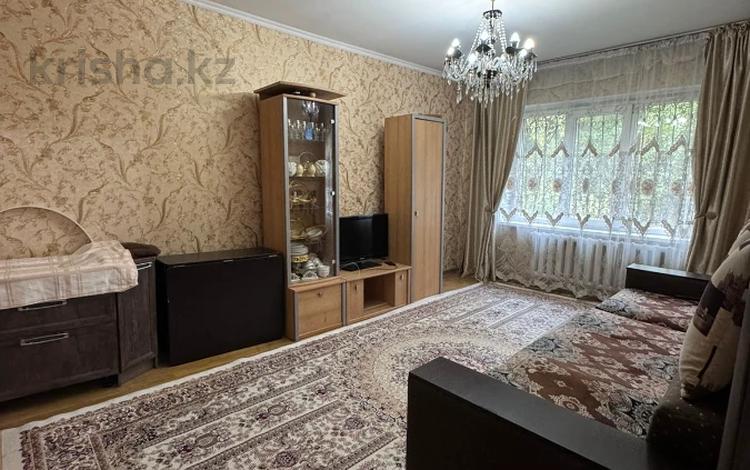 2-комнатная квартира, 58 м², 1/9 этаж, мкр Аксай-1 за 28 млн 〒 в Алматы, Ауэзовский р-н — фото 11