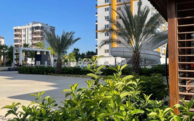 2-комнатная квартира · 89 м² · 3/15 этаж, Tomuk, Hoca Ahmet Yesevi 5 за 33.5 млн ₸ в Мерсине — фото 2