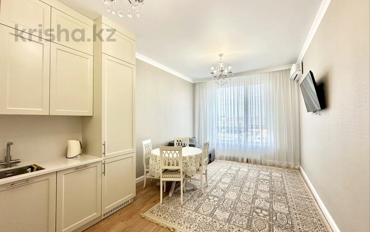 2-комнатная квартира · 55.7 м² · 3/9 этаж, Аль-Фараби 35 за 50 млн ₸ в Астане, Есильский р-н — фото 2