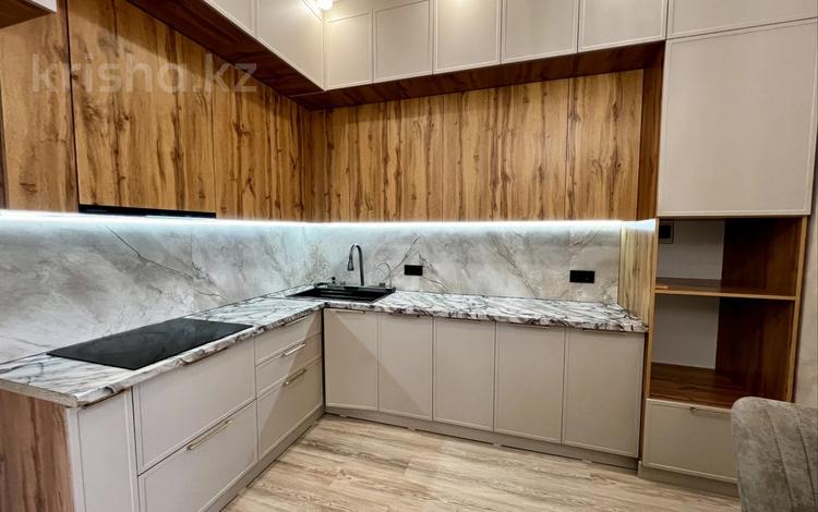 2-комнатная квартира · 55 м² · 12/12 этаж, Абикен Бектуров 9 за 36.5 млн ₸ в Астане, Нура р-н — фото 2