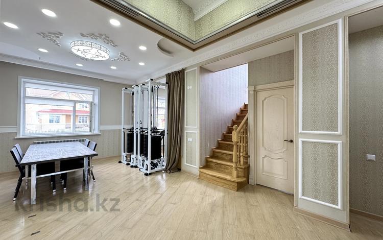 4-комнатная квартира · 125.9 м², Е 717 13 за 100 млн ₸ в Астане, Нура р-н — фото 10