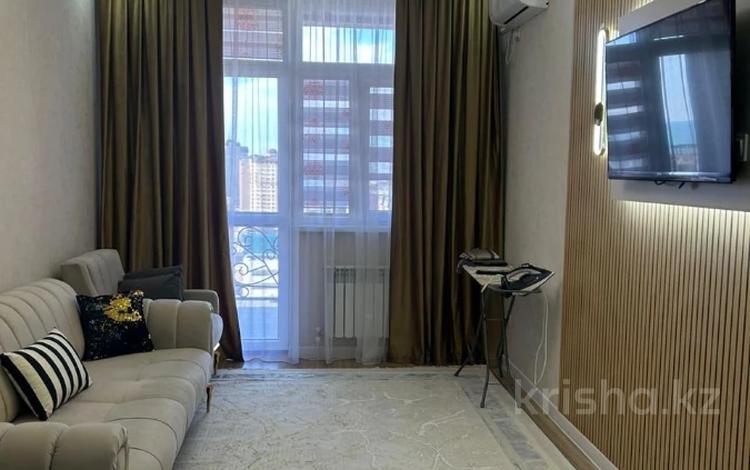1-комнатная квартира · 50 м² · 13/16 этаж, 17-й мкр 54 за 19.5 млн ₸ в Актау — фото 2