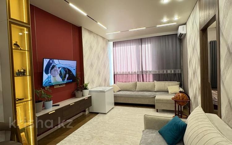 4-комнатная квартира · 105 м² · 10/20 этаж, Тургут Озала 237 за 98 млн ₸ в Алматы, Бостандыкский р-н — фото 2