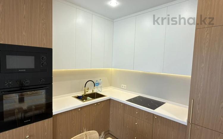 2-комнатная квартира · 56 м² · 12/16 этаж, Утепова 31/8 за 51 млн ₸ в Алматы, Бостандыкский р-н — фото 2