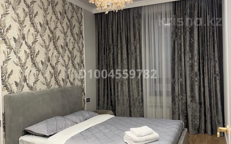 2-комнатная квартира · 56 м² · 17/17 этаж, Толе би 185А — Ауэзова за 385 000 〒 в Алматы, Алмалинский р-н — фото 2