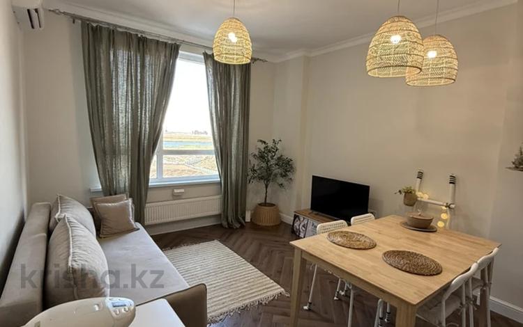 2-комнатная квартира · 67 м² · 9/9 этаж, Толе Би 35/1 за ~ 45 млн ₸ в Астане, Нура р-н — фото 2