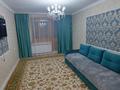 3-комнатная квартира, 70 м², 2 этаж посуточно, Гарышкер за 20 000 〒 в Талдыкоргане — фото 2