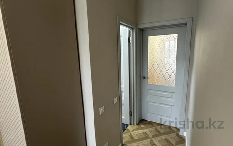 2-комнатная квартира · 70 м² · 13/13 этаж, Толе би 189/3 за 54.8 млн ₸ в Алматы, Алмалинский р-н — фото 2