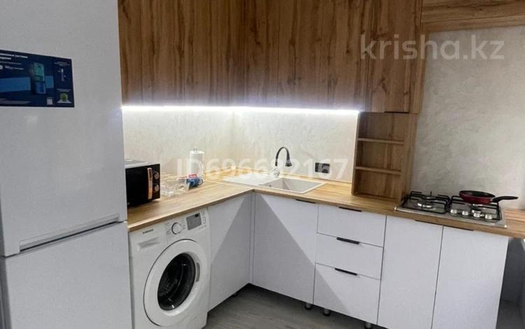 2-комнатная квартира · 44 м² · 1/4 этаж, Улбике акына — Толе би, напротив Баласагун за 18.8 млн ₸ в Таразе — фото 2