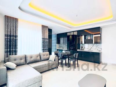 3-комнатная квартира · 100 м² · 8/12 этаж, Mahmutlar, Sinan Paşa Cd. за 60 000 〒 в Аланье