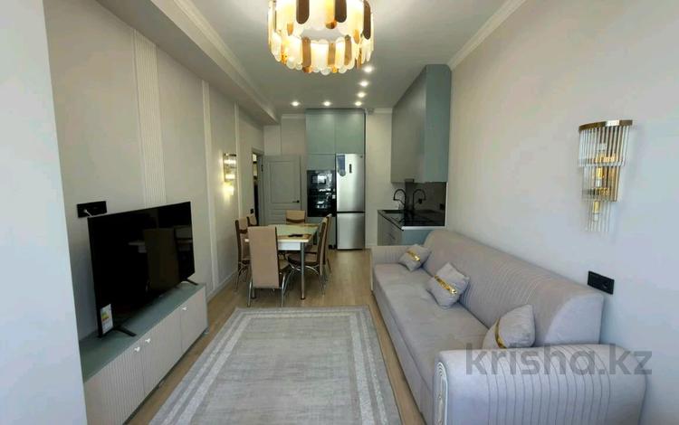 2-бөлмелі пәтер · 50 м² · 10/17 қабат, Толе би 185А, бағасы: 58 млн ₸ в Алматы, Алмалинский р-н — фото 2