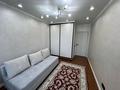 2-комнатная квартира · 57 м² · 14/18 этаж, Жандосова 94А за 60 млн ₸ в Алматы, Бостандыкский р-н — фото 9