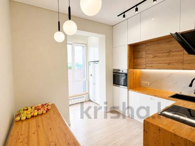 4-комнатная квартира · 100 м² · 4/12 этаж, Ходжанова 57/5 за 102.5 млн ₸ в Алматы, Бостандыкский р-н