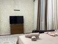 1-комнатная квартира, 55 м², 4/9 этаж посуточно, 4-й переулок Капал — Абая, люкс за 10 000 〒 в Таразе — фото 14