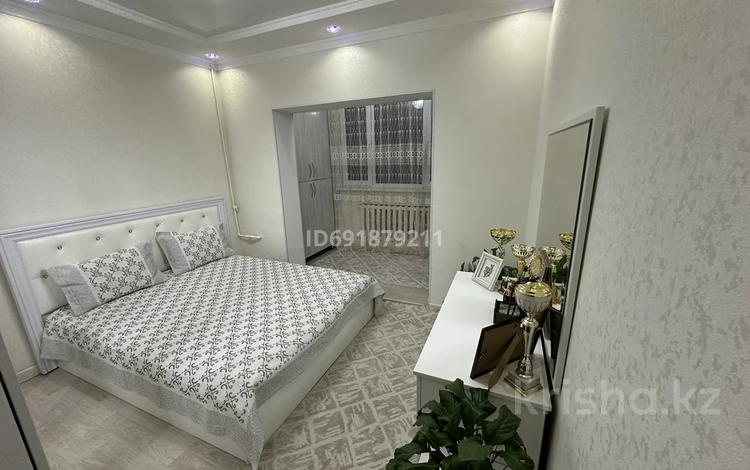 2-комнатная квартира, 52.1 м², 1/5 этаж, 10 мкр 14 за 14 млн 〒 в Таразе — фото 2