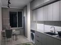 1-комнатная квартира · 51 м² · 5/9 этаж, Гагарина 24а за 160 000 ₸ в Шымкенте, Каратауский р-н — фото 5