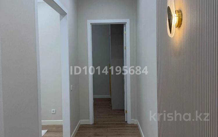 2-комнатная квартира · 58 м² · 5/18 этаж, мкр Уркер, Е-36 4 за 320 000 ₸ в Астане, Нура р-н — фото 2