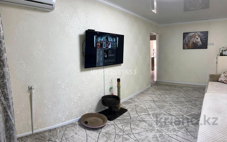 4-комнатная квартира · 84 м² · 3/5 этаж, мкр Аксай-3А 61 за 54.5 млн ₸ в Алматы, Ауэзовский р-н — фото 3