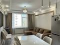 2-комнатная квартира · 53.9 м² · 4/9 этаж, Кабанбай батыра 38/1 за 400 000 ₸ в Астане, Есильский р-н — фото 2