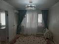 4-комнатная квартира · 74 м² · 2/5 этаж, 3 мкр за 150 000 ₸ в Кульсары — фото 13