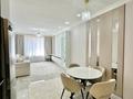 2-комнатная квартира · 56 м² · 8/12 этаж, Райымбека 210 за 53 млн ₸ в Алматы, Алмалинский р-н — фото 2