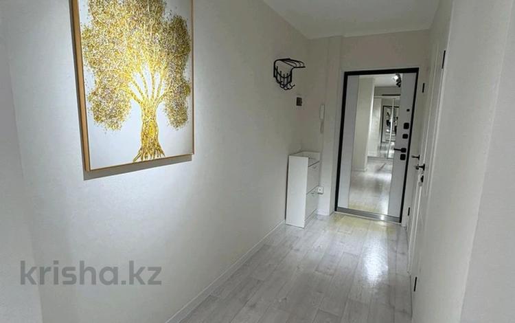 2-комнатная квартира · 57.6 м² · 9/9 этаж, 10 микр 18 за 18.9 млн ₸ в Аксае — фото 2