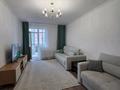 2-комнатная квартира · 56 м² · 5/14 этаж, Богенбай батыра 24/1 за 25 млн ₸ в Астане, Сарыарка р-н — фото 2