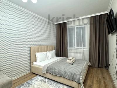 1-комнатная квартира, 40 м², 8/23 этаж посуточно, Кабанбай батыра 46А за 13 000 〒 в Астане, Есильский р-н