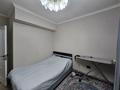3-комнатная квартира · 73.6 м² · 1/9 этаж, мкр Аксай-1А 30 за 47.7 млн ₸ в Алматы, Ауэзовский р-н — фото 10