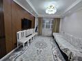 3-комнатная квартира · 73.6 м² · 1/9 этаж, мкр Аксай-1А 30 за 47.7 млн ₸ в Алматы, Ауэзовский р-н — фото 4