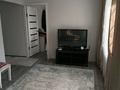 2-комнатная квартира · 57 м² · 2/4 этаж, 2мкр 11дом за 190 000 ₸ в Конаеве — фото 4