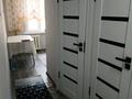 2-комнатная квартира · 57 м² · 2/4 этаж, 2мкр 11дом за 190 000 ₸ в Конаеве — фото 5