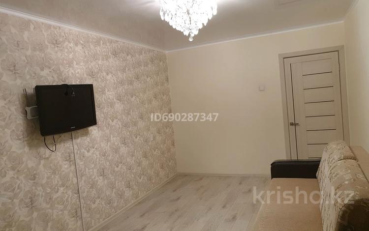 2-комнатная квартира, 47 м², 5/5 этаж, 7 мкр 64/2 за 9.3 млн 〒 в Степногорске — фото 2