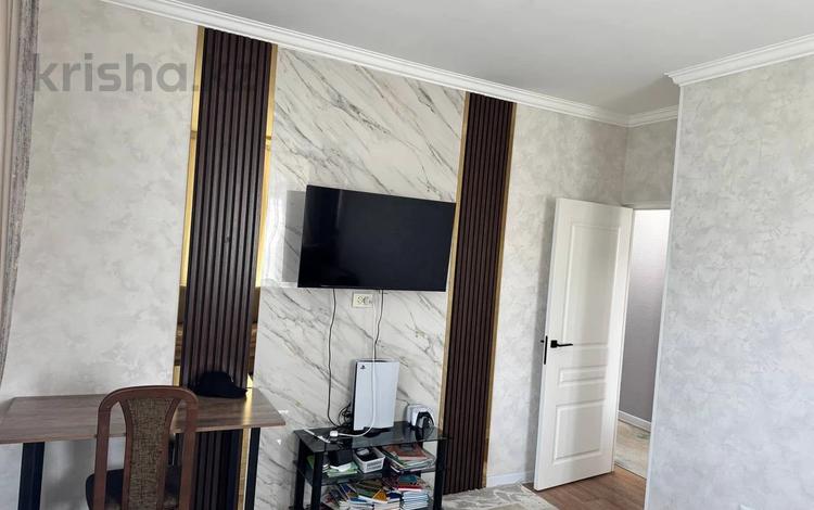 2-бөлмелі пәтер · 54 м² · 5/13 қабат, Б. Момышулы 5, бағасы: 31.5 млн ₸ в Алматы, Алатауский р-н — фото 2
