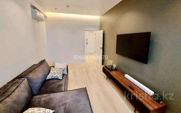 2-комнатная квартира · 86 м² · 6/9 этаж, Кунаева 35 за 20 000 ₸ в Астане, Есильский р-н — фото 6