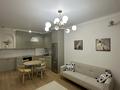 2-комнатная квартира · 55 м² · 12/12 этаж, Бауыржана Момышулы 5/2 — Монке би за 320 000 ₸ в Алматы, Алатауский р-н — фото 32