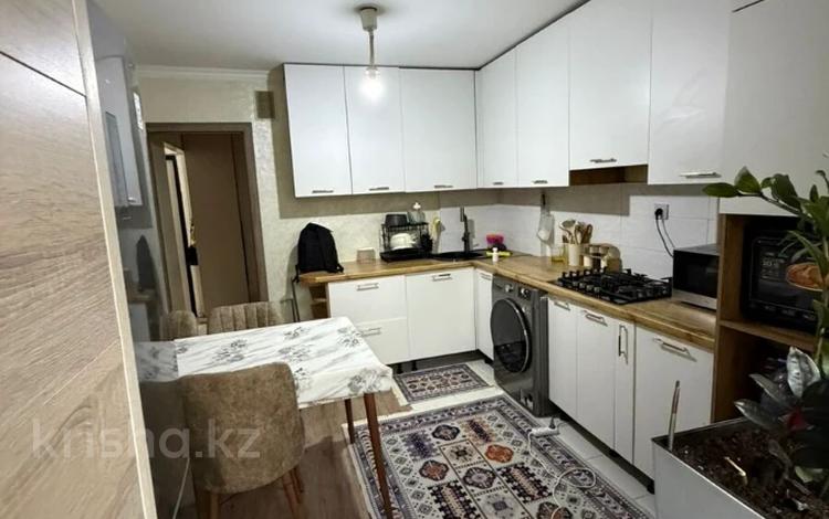 2-бөлмелі пәтер · 51 м² · 2/5 қабат, мкр Аксай-3А 61, бағасы: 36 млн ₸ в Алматы, Ауэзовский р-н — фото 2