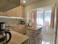 3-комнатная квартира · 72 м² · 1/9 этаж, Мкр. Таугуль-1 за 52 млн ₸ в Алматы, Ауэзовский р-н — фото 2