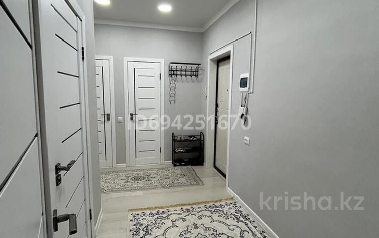 2-комнатная квартира, 60 м², 3/5 этаж, 8мкр 17 за 25 млн 〒 в Талдыкоргане, мкр Бирлик — фото 2