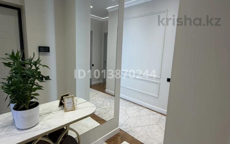 2-бөлмелі пәтер · 67 м² · 5/16 қабат, Абая 165 — Тургут Озала, бағасы: 83.5 млн ₸ в Алматы, Алмалинский р-н — фото 2