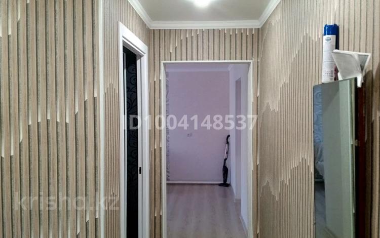 3-комнатная квартира · 55 м² · 1/2 этаж, Юдичева 8 — 3 школа, городской парк,магазин Куаныш за 12.5 млн 〒 в Текели — фото 2