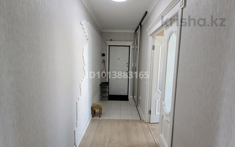2-комнатная квартира · 67.7 м² · 8/9 этаж, Абая 50 — ТД "Жаннур" за 30 млн ₸ в Астане, р-н Байконур — фото 2