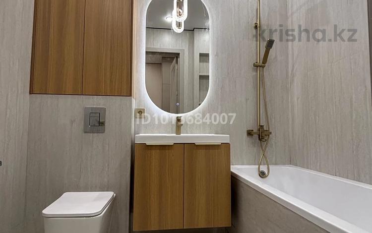 2-комнатная квартира · 40 м² · 3/14 этаж, Толе би 28/1 за 33.8 млн ₸ в Астане, Нура р-н — фото 2
