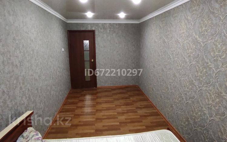 2-комнатная квартира, 44 м², 5/5 этаж помесячно, 7 мкр 1 за 30 000 〒 в Житикаре — фото 2