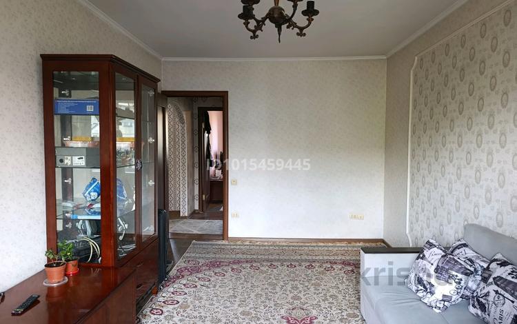 2-комнатная квартира · 52 м² · 5/5 этаж, мкр Аксай-3Б 10 за 30.9 млн ₸ в Алматы, Ауэзовский р-н — фото 2