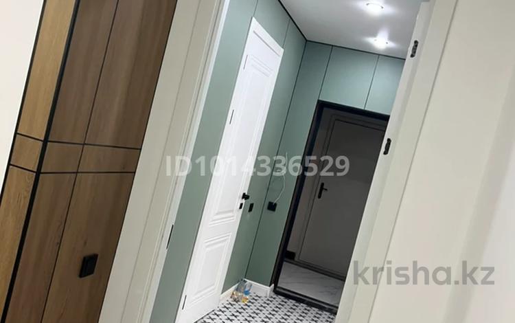 2-комнатная квартира · 60 м² · 5/15 этаж, Жандосова 94/8 за 62 млн ₸ в Алматы, Бостандыкский р-н — фото 2