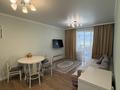 2-комнатная квартира · 55 м² · 12/12 этаж, Кабанбай батыра 59б за 33 млн ₸ в Астане, Нура р-н — фото 2
